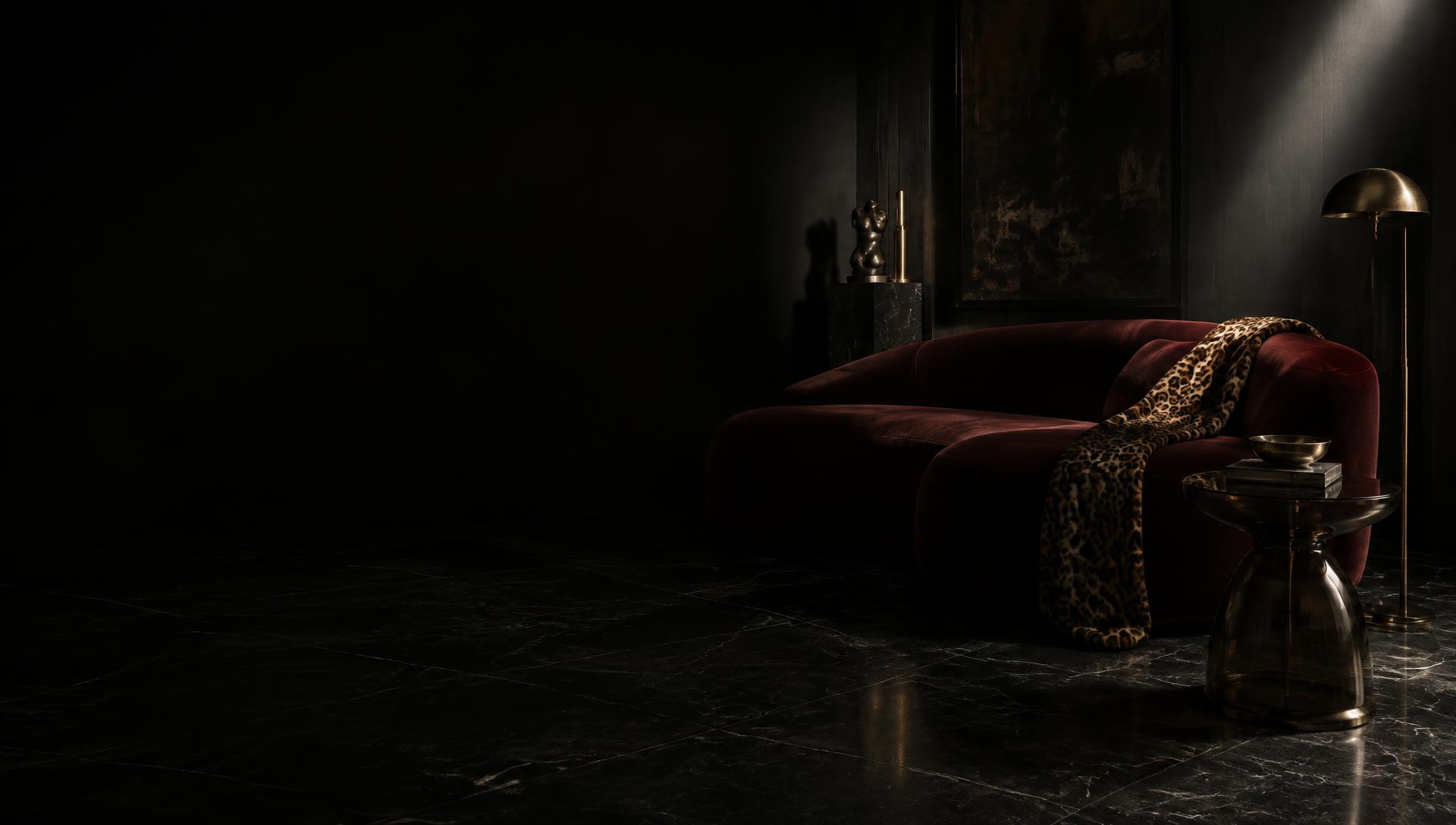 The Nurian Sofa in Oxblood velvet · Leopard throw